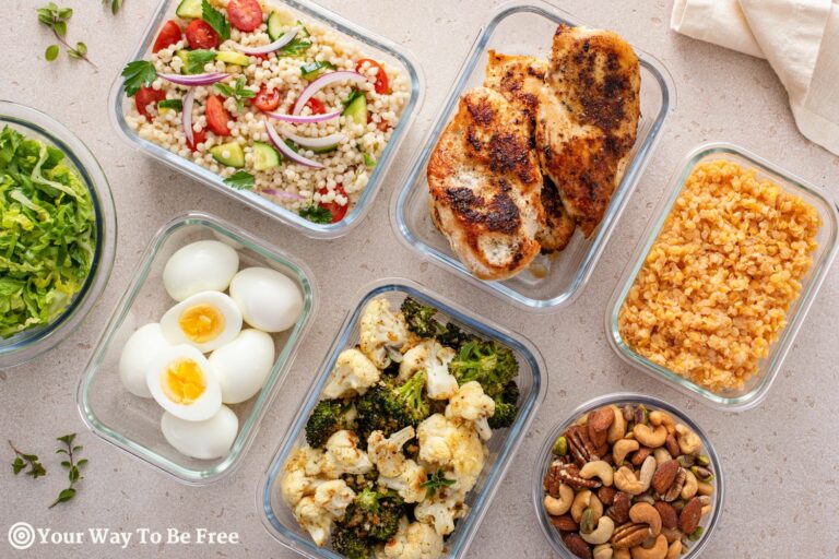 Healthy meal prep with cooked chicken breast, boiled eggs, roasted vegetables, cooked lentils, couscous salad and nuts. nutrition on the go, Healthy Meal Ideas