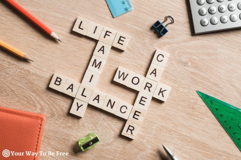 Words work life balance and family on table collected with wooden cubes.